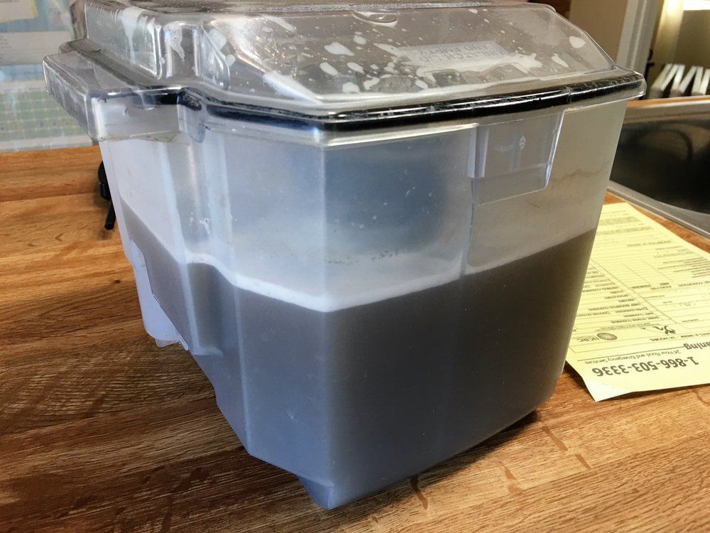 This is how much dirty water the homeowner sucked up with her own cleaner AFTER THEY LEFT!